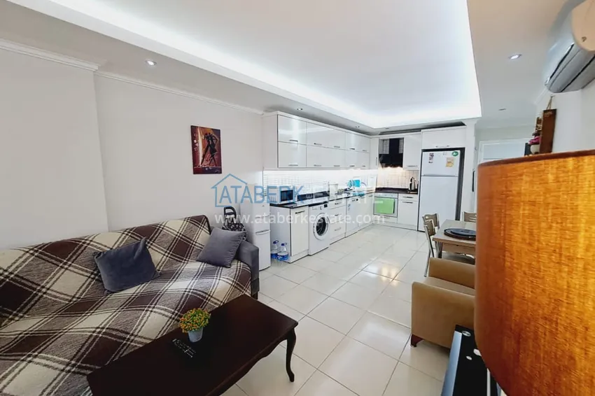 Приобрести Двухкомнатная квартира с мебелью и застекленным балконом в районе Оба, Алания 5