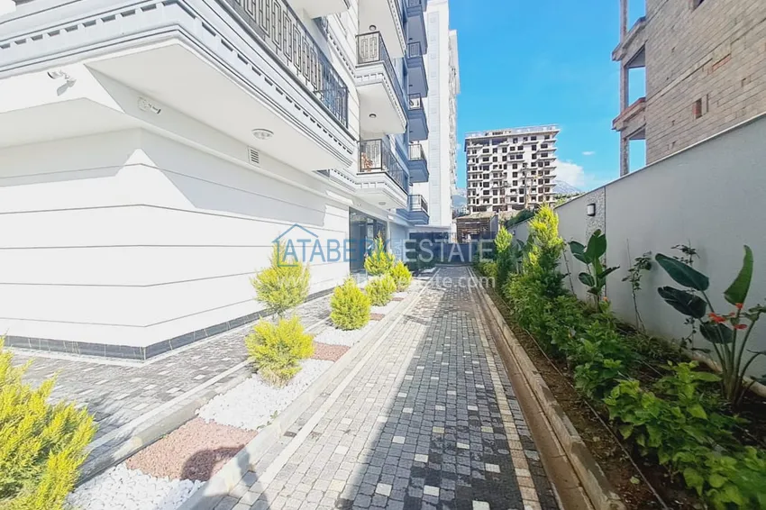 Двухкомнатная квартира с чистовой отделкой в Махмутларе – район субботнего рынка 7 