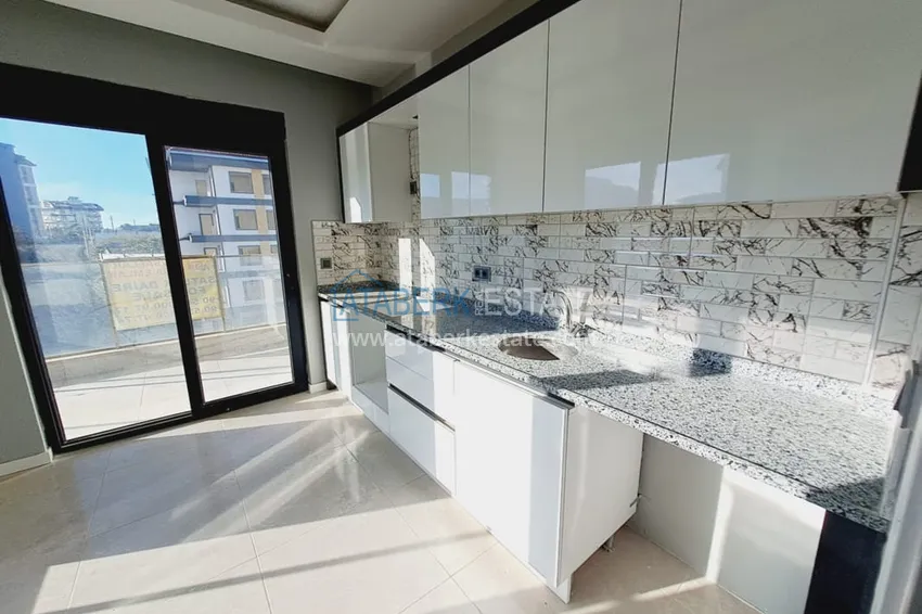 Приобрести Квартира 2+1 с отдельной кухней в комплексе комфорт-класса, район Авсаллар – Алания 3 