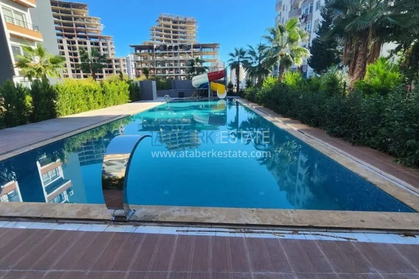 Квартира 1+1 меблированная в новом жилом комплексе в районе Тедже – Мерсин 2 