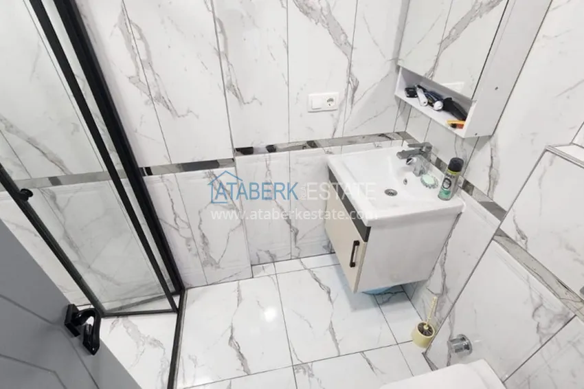 Приобрести Квартира 1+1 меблированная в новом жилом комплексе в районе Тедже – Мерсин 7 