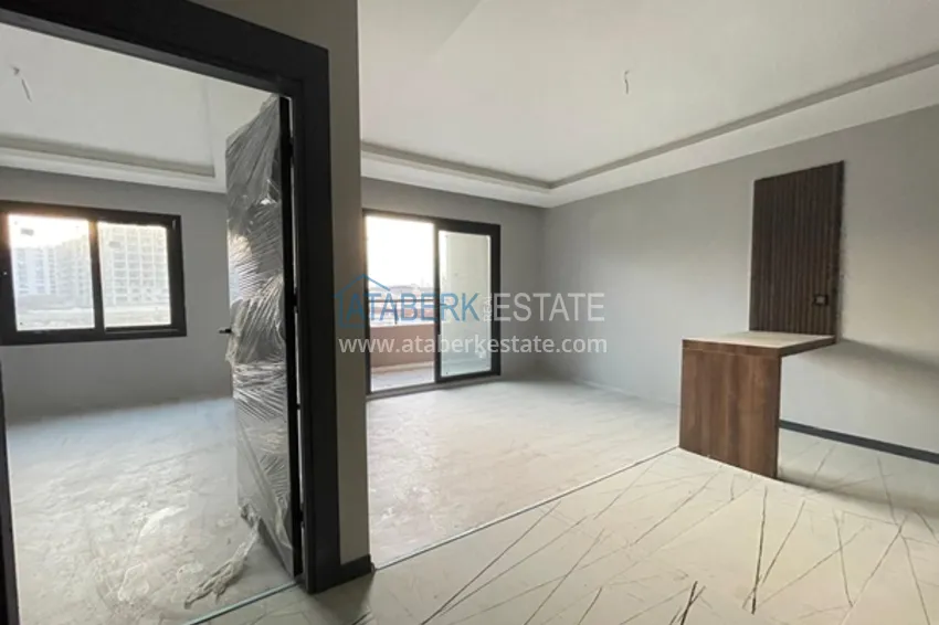 Приобрести Квартиры 1+1 в новом жилом комплексе в районе Томюк – Мерсин 9 