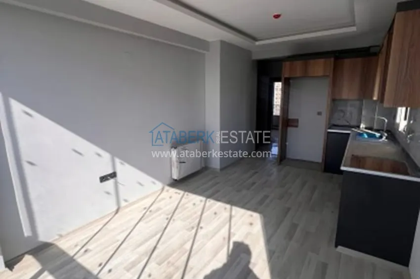 Приобрести Трехкомнатная квартира с чистовой отделкой в 100 метрах от моря район Тедже – Мерсин 2 