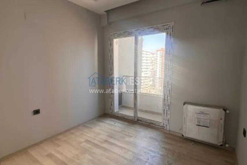 Приобрести Трехкомнатная квартира с чистовой отделкой в 100 метрах от моря район Тедже – Мерсин 14 