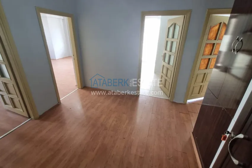 Приобрести Трехкомнатная квартира с отдельной кухней в курортном городке рядом с морем – район Махмутлар 2 
