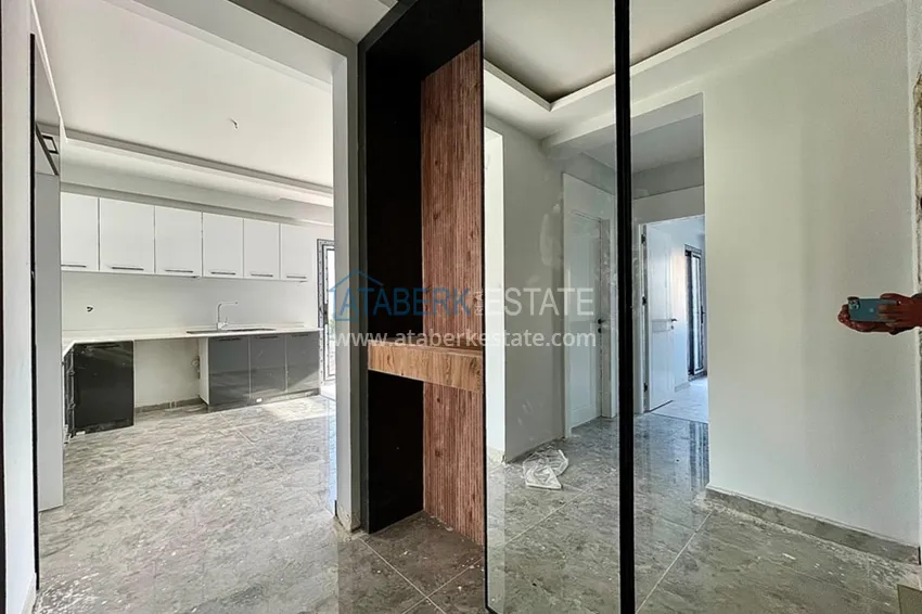 Приобрести Квартиры 2+1 на этапе строительства в районе Томюк-Мерсин 5 