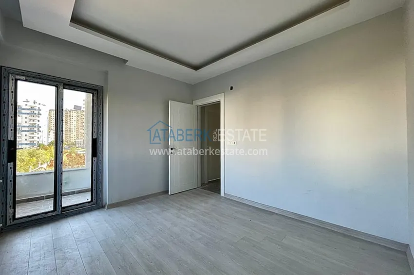 Приобрести Квартиры 2+1 на этапе строительства в районе Томюк-Мерсин 10 