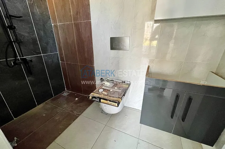 Приобрести Квартиры 2+1 на этапе строительства в районе Томюк-Мерсин 15 