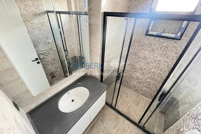 Приобрести Квартира 3+1 с отдельной кухней на этапе строительства в центре района Эрдемли-Мерсин 18 