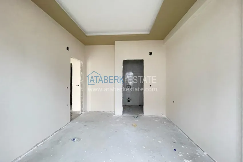 Фото -  Квартиры на этапе строительства в современном жилом комплексе в районе Давултепе-Мерсин 15 