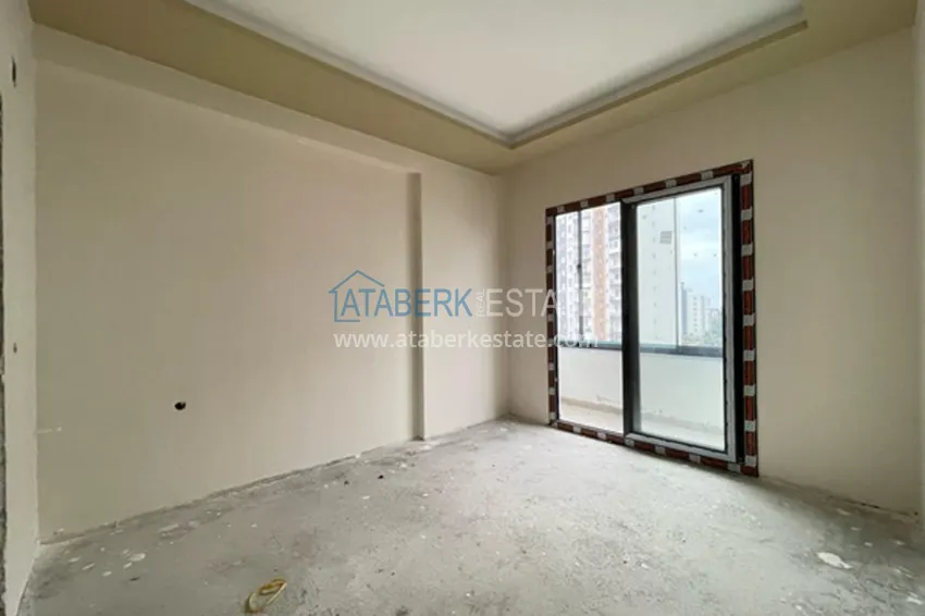 Фото -  Квартиры на этапе строительства в современном жилом комплексе в районе Давултепе-Мерсин 16 