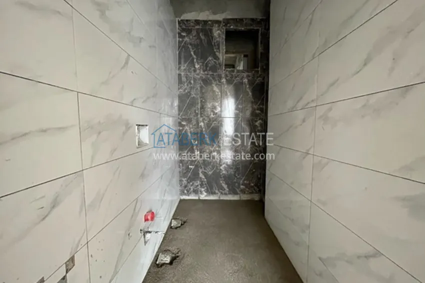 Фото -  Квартиры на этапе строительства в современном жилом комплексе в районе Давултепе-Мерсин 11 