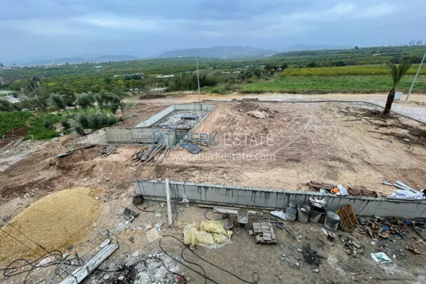 Фото -  Квартиры на этапе строительства в современном жилом комплексе в районе Давултепе-Мерсин 26 