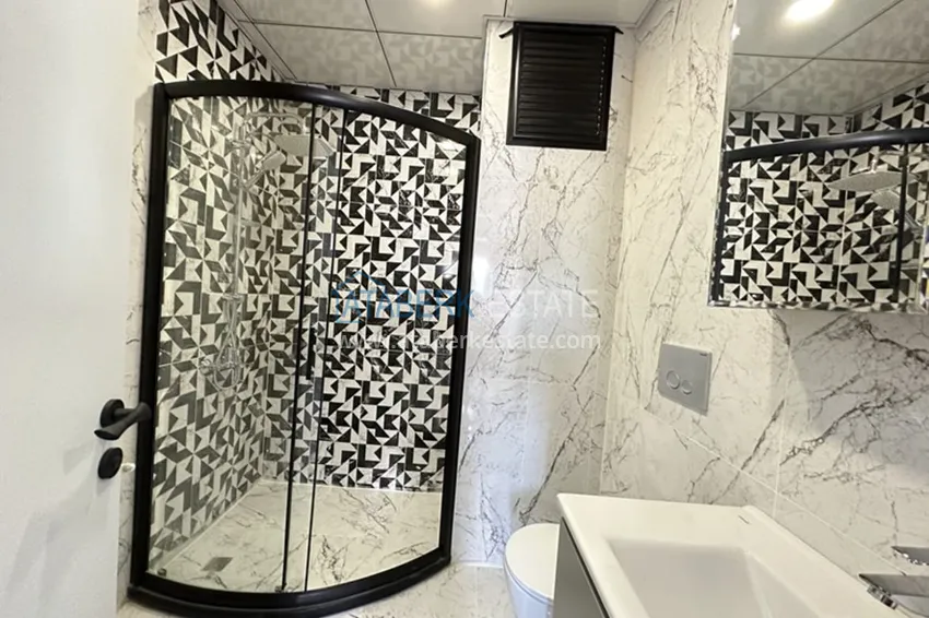 Приобрести Квартира 2+1 с видом на море на этапе строительства Томюк-Мерсин 8 