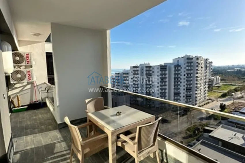 Приобрести Квартира 1+1 с мебелью и техникой в жилом комплексе комфорт- класса район Арпачбахшиш-Мерсин 11 