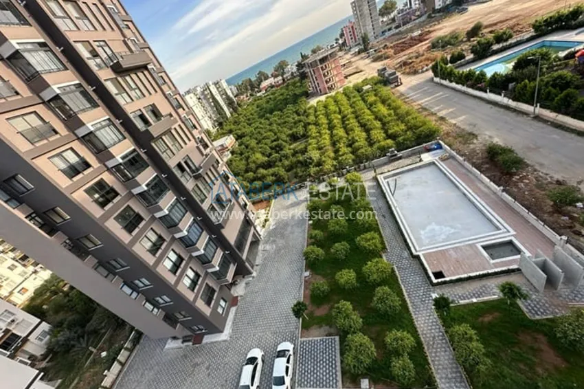 Дуплекс 2+1 с чистовой отделкой и видом на море в районе Тедже-Мерсин 2 