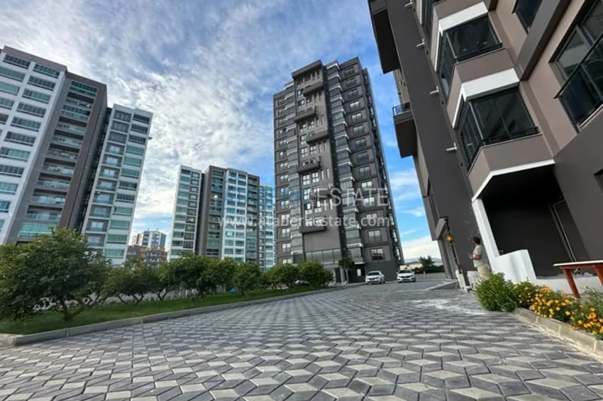 Дуплекс 2+1 с чистовой отделкой и видом на море в районе Тедже-Мерсин 1 