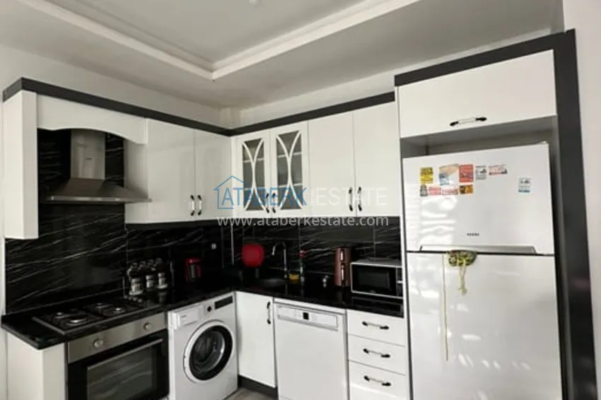 Приобрести Квартира 1+1 с мебелью и техникой в жилом комплексе комфорт- класса район Арпачбахшиш-Мерсин 4 