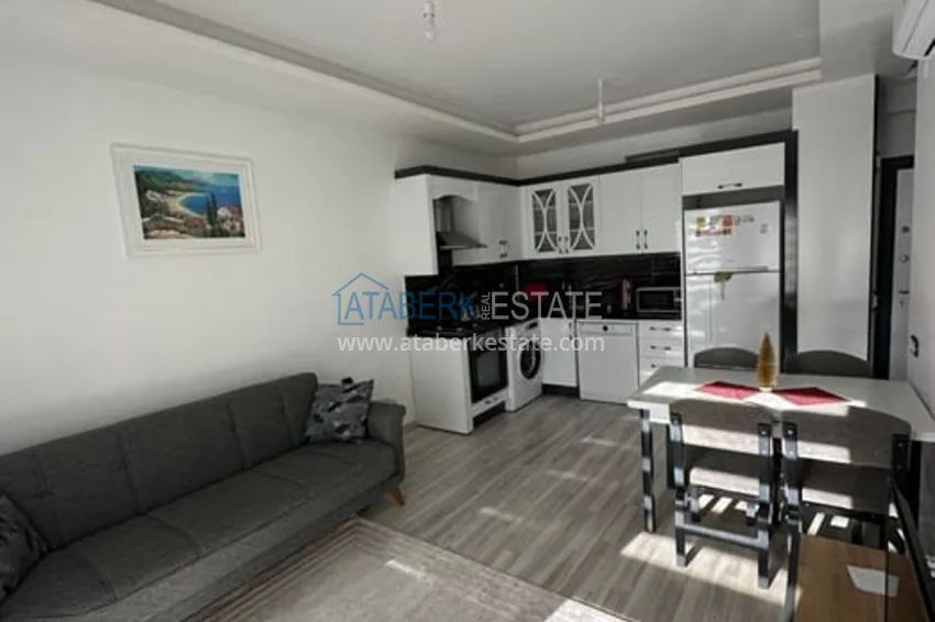 Приобрести Квартира 1+1 с мебелью и техникой в жилом комплексе комфорт- класса район Арпачбахшиш-Мерсин 1 