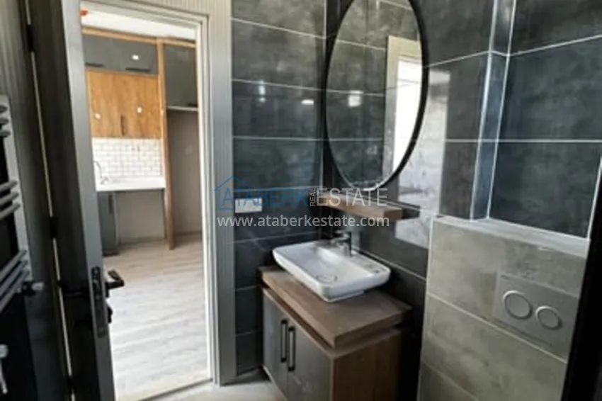 Приобрести Квартира 1+1 с чистовой отделкой в районе Мезитли – Мерсин 19 