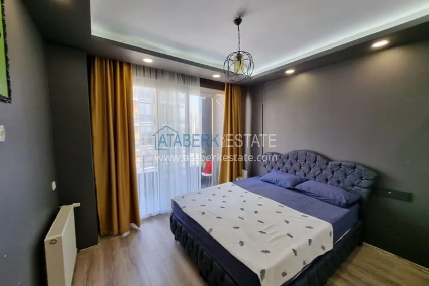 Приобрести Двухкомнатная квартира с мебелью и техникой в 100 метрах от моря район Мезитли-Мерсин 6