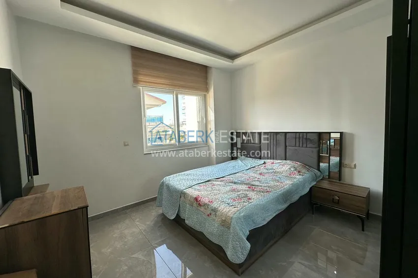 Приобрести Меблированная двухкомнатная квартира от собственника в 500 метрах от моря – центр района Авсаллар  10 