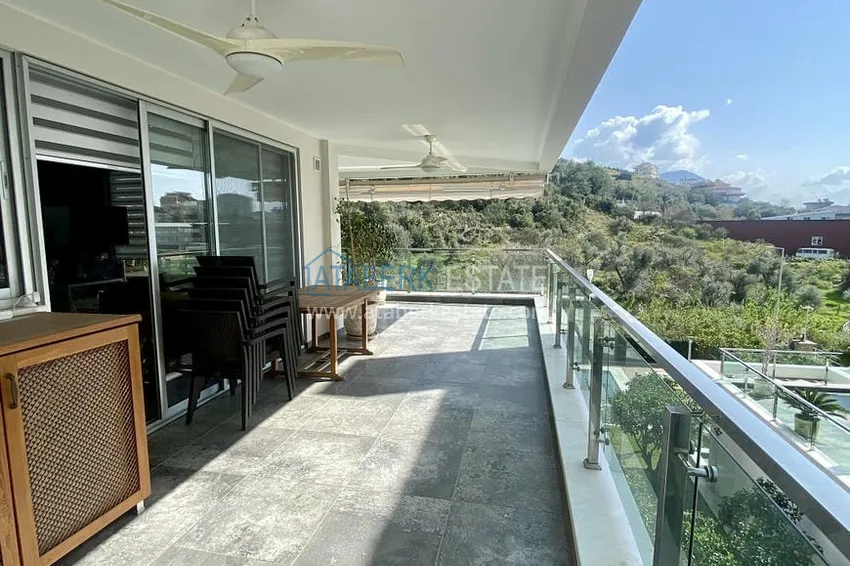 Приобрести Недвижимость под ВНЖ! Квартира с мебелью и видом на море в районе Джикджилли 11 