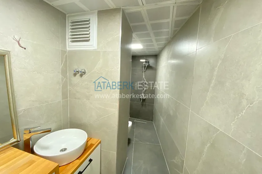 Приобрести Двухкомнатная квартира после ремонта с мебелью и панорамным видом на море в исторической части Алании – Кале 12 