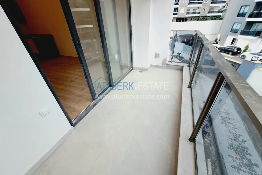 Приобрести Двухкомнатная квартира в Махмутларе с рассрочкой в новостройке 11