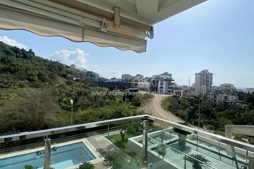 Приобрести Недвижимость под ВНЖ! Квартира с мебелью и видом на море в районе Джикджилли 12 