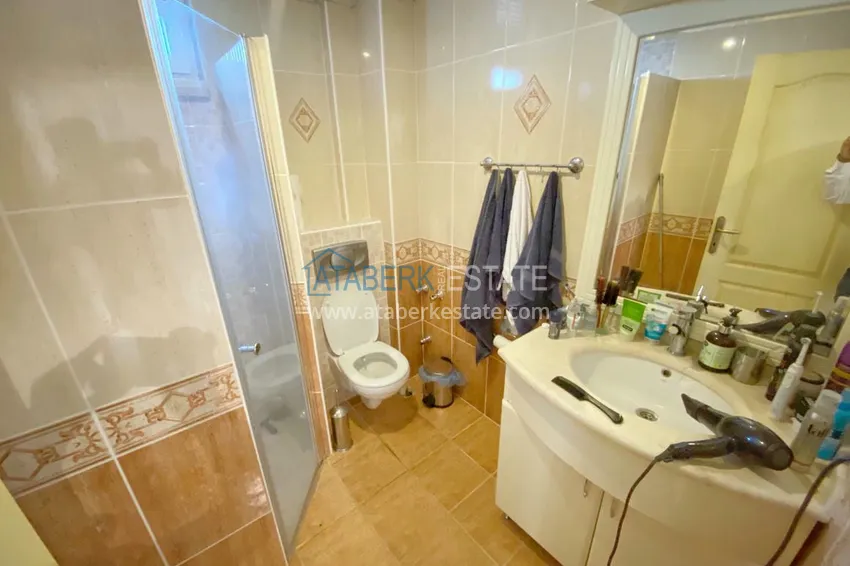 Приобрести Двухкомнатная квартира с мебелью в небольшом комплексе – центр Алании, 300 метров от пляжа Клеопатра 14 