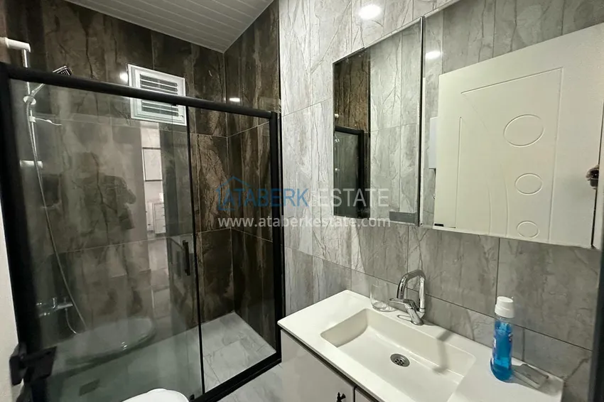 Приобрести Меблированная двухкомнатная квартира от собственника в 500 метрах от моря – центр района Авсаллар  12 