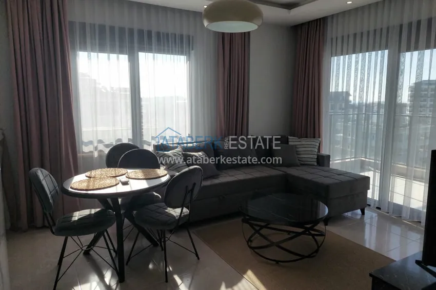 Приобрести Меблированная двухкомнатная квартира в районе Авсаллар. Новостройки Алании 13 