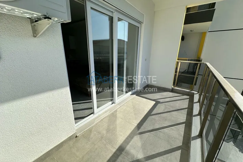 Приобрести Меблированная двухкомнатная квартира от собственника в 500 метрах от моря – центр района Авсаллар  13 