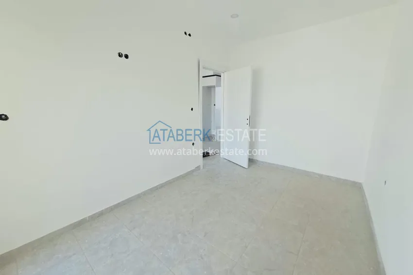 Приобрести Первичная недвижимость! Квартиры с чистовой отделкой в Алании - район Авсаллар 13 