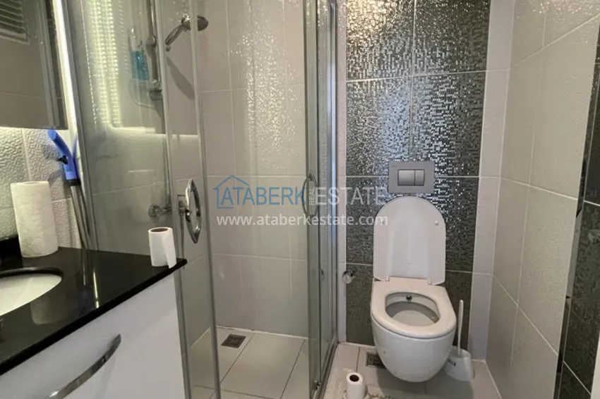 Приобрести Просторная двухкомнатная квартира с мебелью и видом на море в районе Оба, Алания 16 