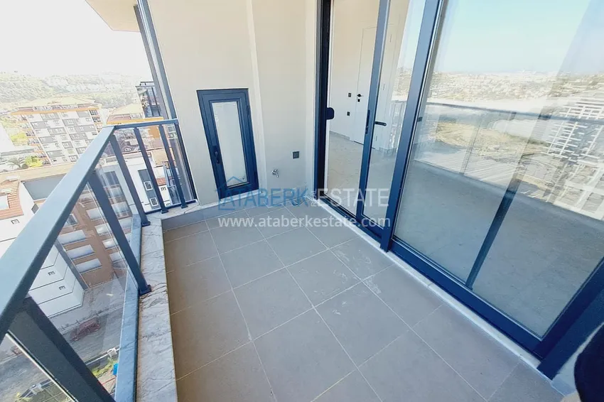 Приобрести Супер цена! Квартиры с чистовой отделкой и видом на море в новом роскошном комплексе – Алания, район Авсаллар 33 