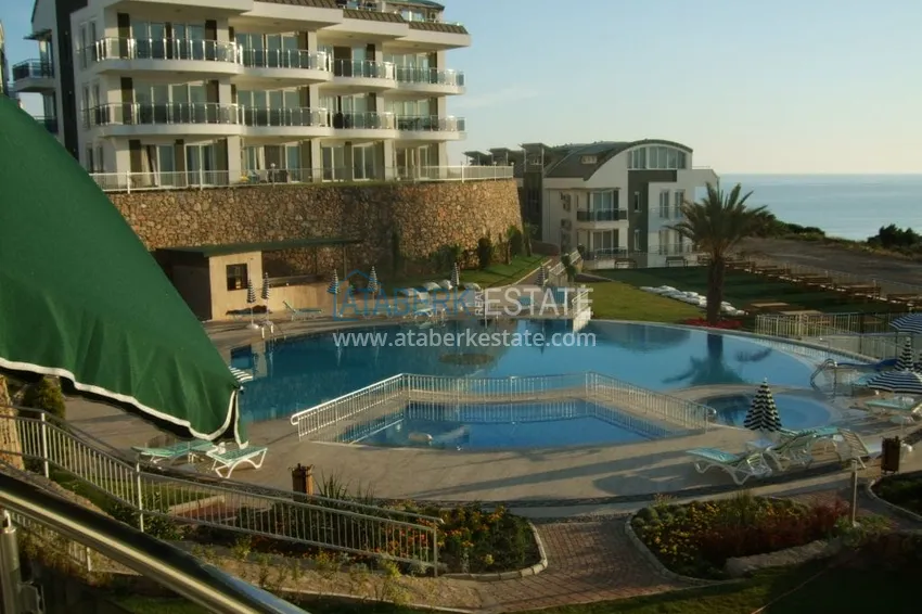 Приобрести Просторная двухкомнатная квартира с мебелью и видом на море в районе Оба, Алания 1 