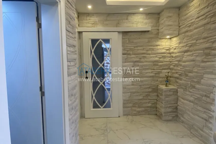 Приобрести Двухкомнатная квартира после ремонта с мебелью и панорамным видом на море в исторической части Алании – Кале 2 