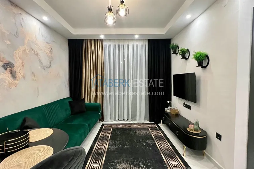 Приобрести Квартира 1+1 с новой мебелью и видом на море, район Махмутлар – Алания 1 