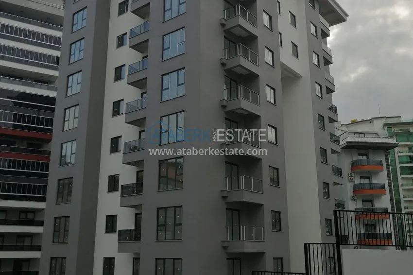 Трехкомнатная квартира в новостройке - район Махмутлар, Алания  1 
