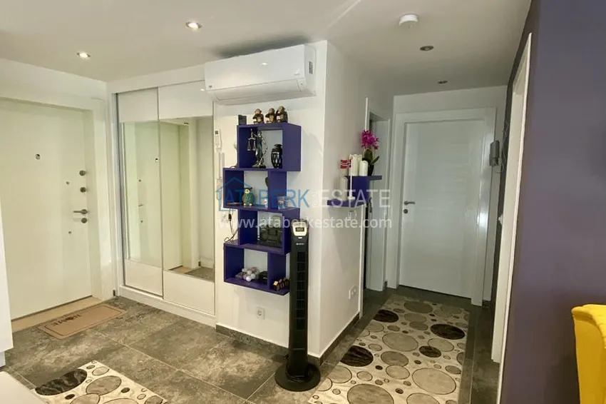 Приобрести Недвижимость под ВНЖ! Квартира с мебелью и видом на море в районе Джикджилли 1 