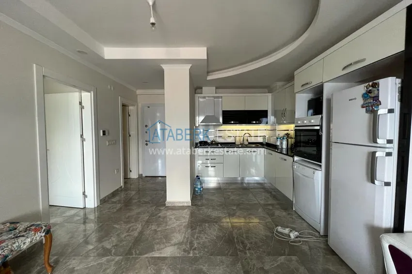 Приобрести Просторная двухкомнатная квартира с мебелью и видом на море в районе Оба, Алания 2 