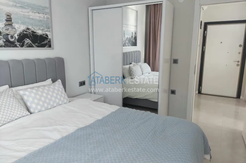 Приобрести Меблированная двухкомнатная квартира в районе Авсаллар. Новостройки Алании 20 