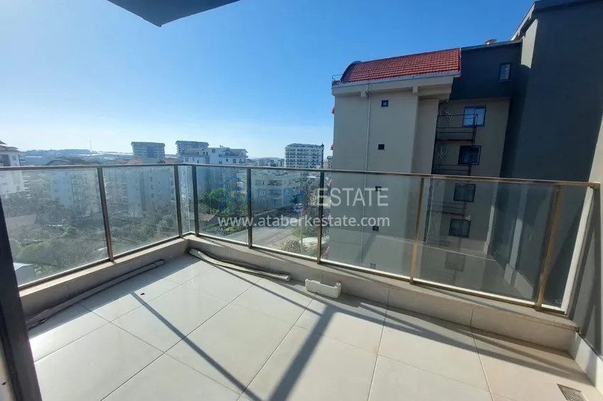 Приобрести Меблированная двухкомнатная квартира в районе Авсаллар. Новостройки Алании 26 