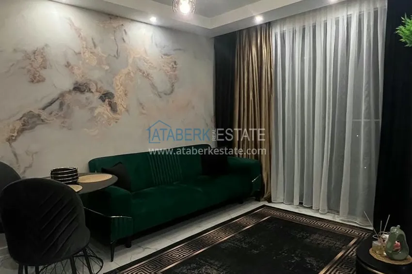 Приобрести Квартира 1+1 с новой мебелью и видом на море, район Махмутлар – Алания 2 