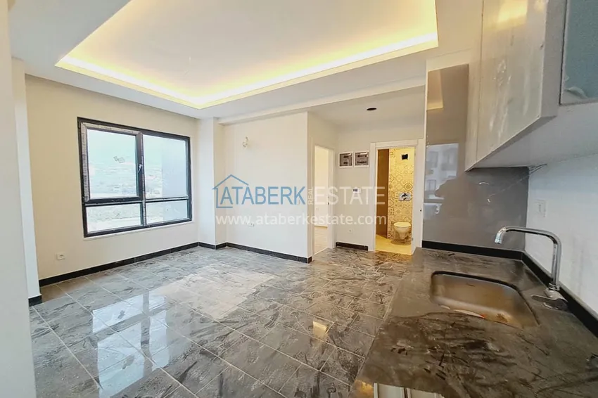 Приобрести Квартиры от собственника с чистовой отделкой в районе Махмутлар, Алания - 600 метров от моря 3