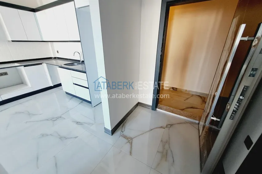 Приобрести Двухкомнатная квартира в новом комплексе, район Паяллар, Алания 1