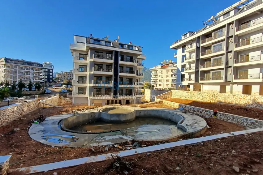 Трехкомнатная квартира с чистовой отделкой в районе Оба, Алания 3