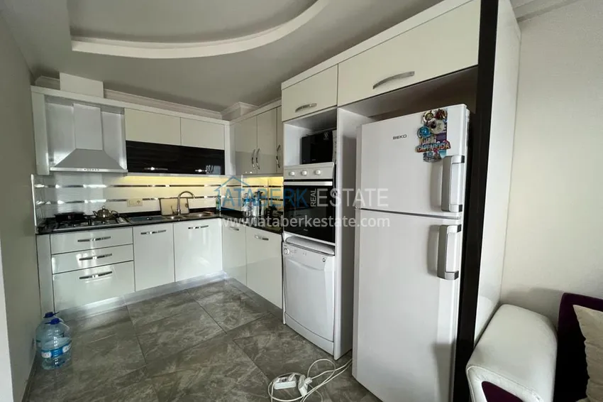 Приобрести Просторная двухкомнатная квартира с мебелью и видом на море в районе Оба, Алания 4 